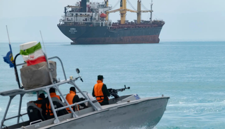 An Islamic Revolutionary Guard Corps (IRGC) speed boat sailing along the Persian Gulf near a cargo vessel. Nurphoto | Nurphoto | Getty Images